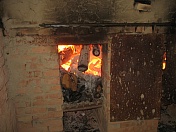 Zapálení ohně v kruhové peci